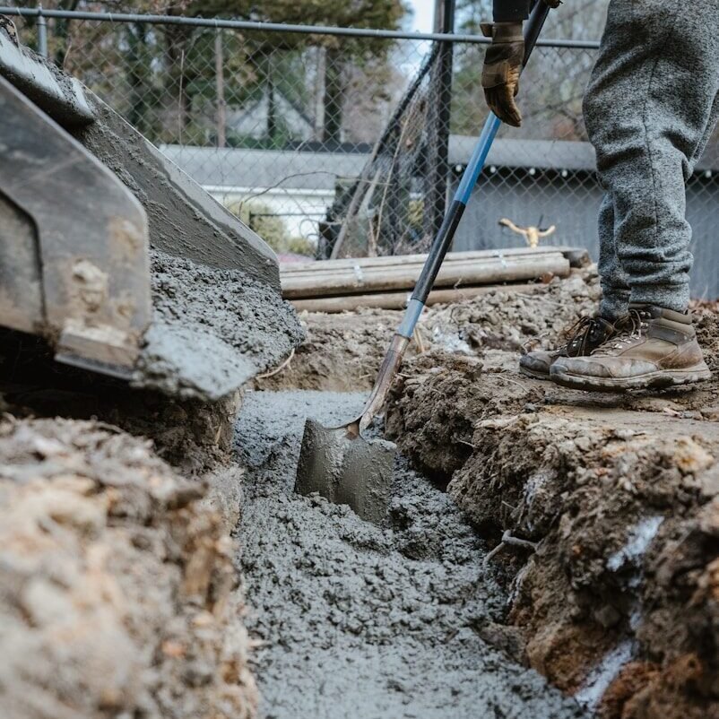 a person digging in the dirt